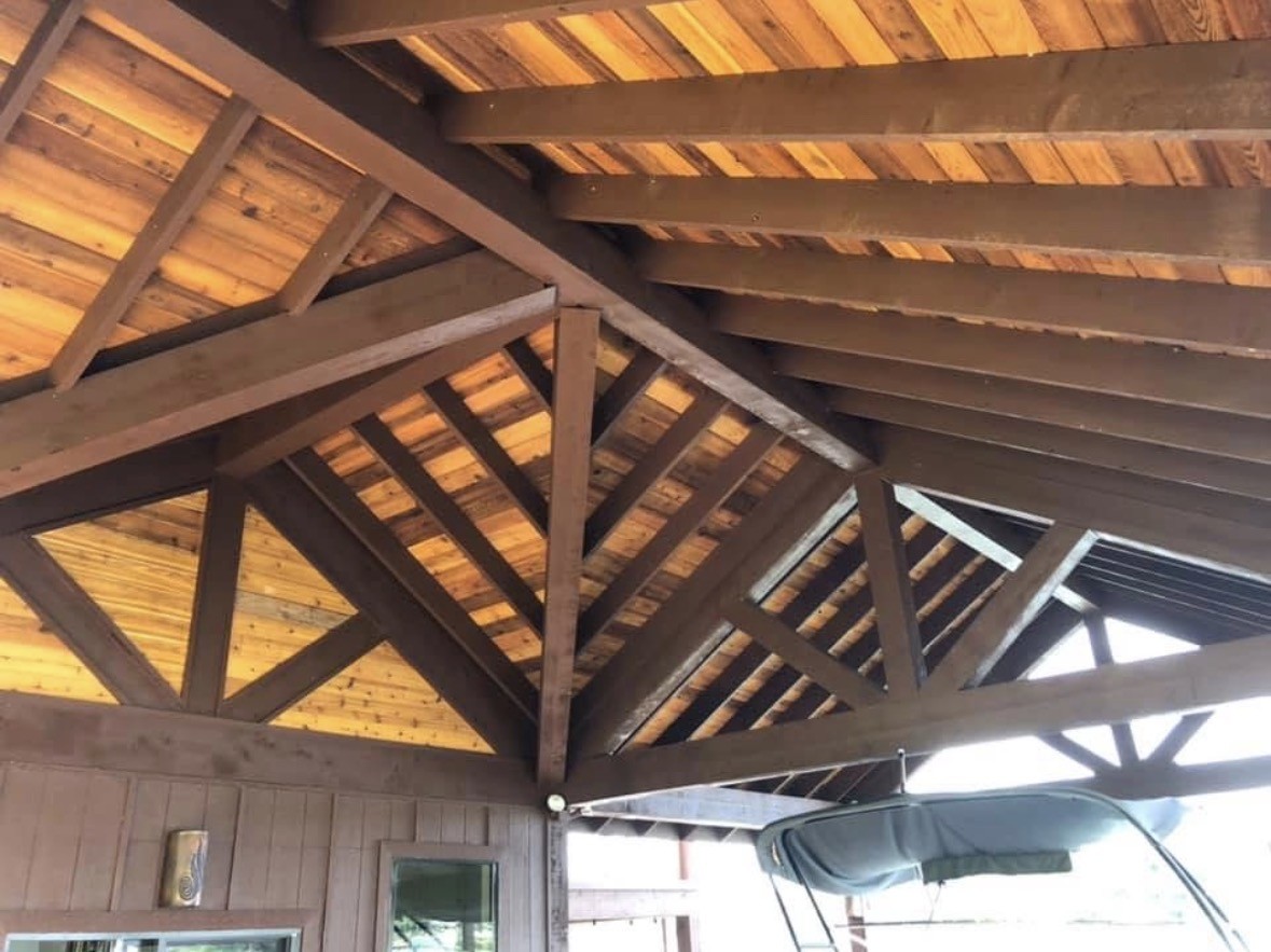 Finished cedar roof and exposed structural trusses